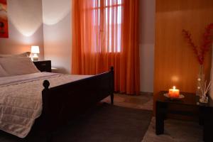 Postel nebo postele na pokoji v ubytování Green House Nafplio