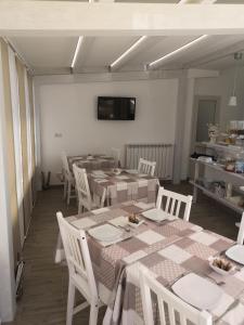 Televízia a/alebo spoločenská miestnosť v ubytovaní B&B My Sicily