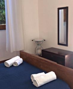A bed or beds in a room at Villa Rica