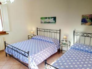 A bed or beds in a room at Villa Margherita - Comfort house