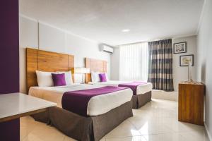 Katil atau katil-katil dalam bilik di City Suites & Beach Hotel