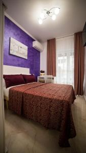 Ένα ή περισσότερα κρεβάτια σε δωμάτιο στο St. Peter Area Luxury Suites