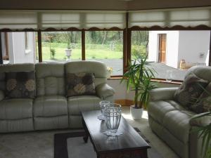 Posezení v ubytování Woodlands House