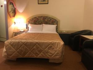 Ein Bett oder Betten in einem Zimmer der Unterkunft 真正好旅店 Good Hotel