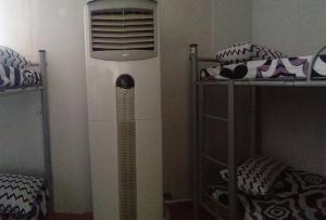 Postel nebo postele na pokoji v ubytování Mang Ben Dormitory