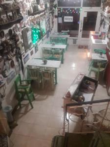 an overhead view of a store with tables and chairs at Hotel Florencia in Necochea