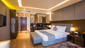 Un ou plusieurs lits dans un hébergement de l'établissement DTX Hotel Nha Trang