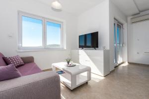 Μια τηλεόραση ή/και κέντρο ψυχαγωγίας στο Villa Mirta