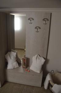 Postel nebo postele na pokoji v ubytování Kalymnos Suite home