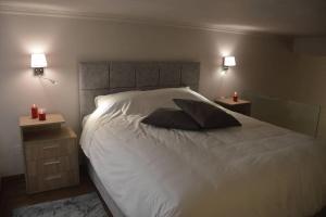 Postel nebo postele na pokoji v ubytování Kalymnos Suite home
