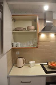 Kuchyň nebo kuchyňský kout v ubytování Kalymnos Suite home