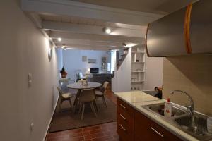 Kuchyň nebo kuchyňský kout v ubytování Kalymnos Suite home