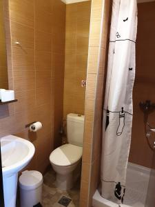 Koupelna v ubytování Plaza Hotel