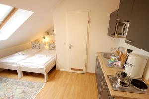 Ein Bett oder Betten in einem Zimmer der Unterkunft Haus Anna by Rujana
