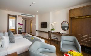 Télévision ou salle de divertissement dans l'établissement DTX Hotel Nha Trang