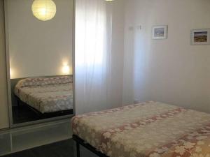 Ένα ή περισσότερα κρεβάτια σε δωμάτιο στο Casa del Sole - Bilocale ristrutturato