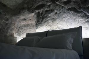 Posteľ alebo postele v izbe v ubytovaní 5 Elementi Sassi Matera