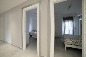 Postel nebo postele na pokoji v ubytování SaMi B&B