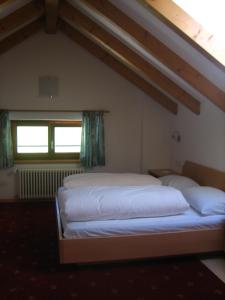 Postel nebo postele na pokoji v ubytování Garni - Appartement Neumairhof