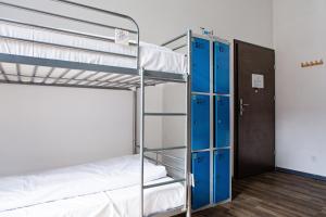 Posteľ alebo postele v izbe v ubytovaní Folk Hostel
