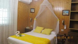 Łóżko lub łóżka w pokoju w obiekcie Hotel Playa Samil Vigo