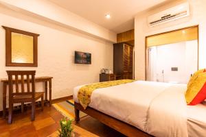Letto o letti in una camera di Hotel Mala Pokhara