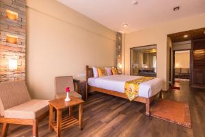 Letto o letti in una camera di Hotel Mala Pokhara