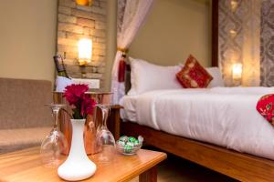 Letto o letti in una camera di Hotel Mala Pokhara