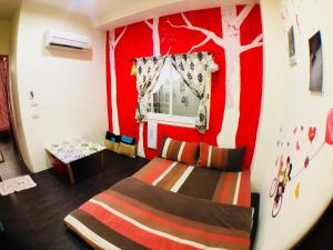 Fei Yu Fei Beach Hostel客房内的一张或多张床位