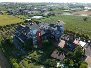 an aerial view of a large house with a yard at Vanilla Twilight in Wujie