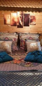 Postel nebo postele na pokoji v ubytování Aux murmures de la nature B&B