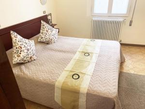 Posteľ alebo postele v izbe v ubytovaní Casa Vacanza Della Nonna + 37 fotografií