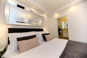 Säng eller sängar i ett rum på KIKO Luxury Accommodation