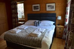 Postel nebo postele na pokoji v ubytování Chalet Morville