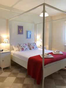 מיטה או מיטות בחדר ב-Villa Arzilla Sardegna