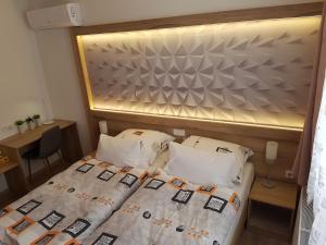 Katil atau katil-katil dalam bilik di Hotel Gól Prostějov