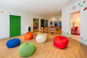 a room with several colored bean bags on the floor at Hotel LIVVO Volcán Lanzarote in Playa Blanca