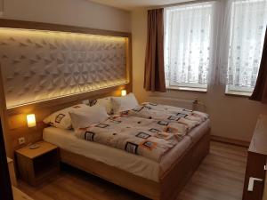 Katil atau katil-katil dalam bilik di Hotel Gól Prostějov