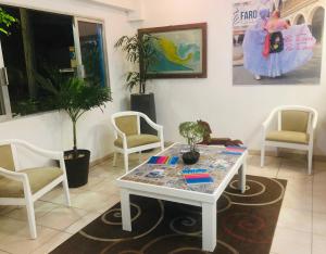 Posezení v ubytování Hotel El Faro Malecon