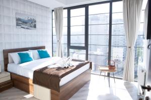 Postel nebo postele na pokoji v ubytování Boutique Hotel
