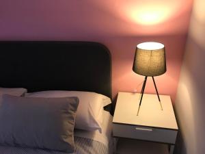 Posteľ alebo postele v izbe v ubytovaní Casapiu Rooms