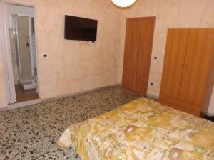 Postel nebo postele na pokoji v ubytování Bed And Breakfast Il Subacqueo