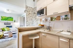 Kuhinja oz. manjša kuhinja v nastanitvi BpR Green Paradise Apartment