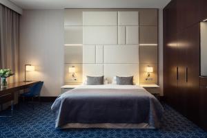 Postel nebo postele na pokoji v ubytování Hotel KINGS COURT