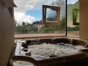 Fotografie z fotogalerie ubytování Aparthotel Malga v destinaci Caldaro