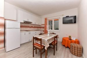 Kuchyň nebo kuchyňský kout v ubytování Apartment Sofija