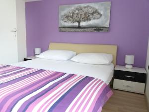 Posteľ alebo postele v izbe v ubytovaní Apartments Benic
