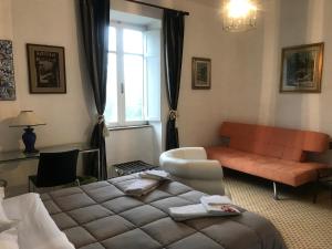 Postel nebo postele na pokoji v ubytování alloggio turistico La Stalla