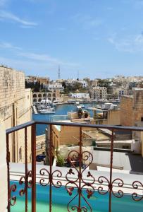 a view of a city from a balcony at 6 in Birgu