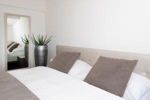 Posteľ alebo postele v izbe v ubytovaní Hotel Roggerli